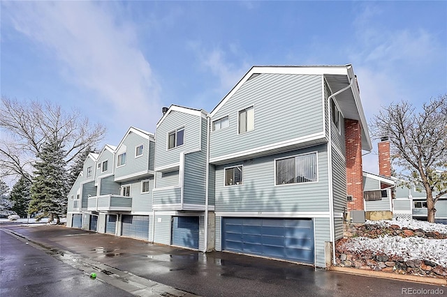 exterior space featuring a garage