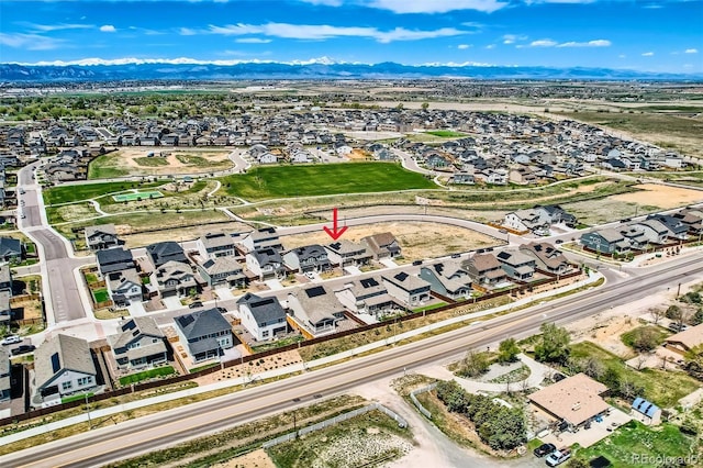 14551 Hudson St, Thornton, CO 80602 - aerial view of residential area featuring a mountainous background