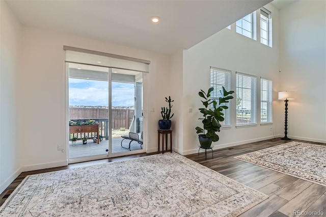 14551 Hudson St, Thornton, CO 80602 - bedroom with access to outside, wood finished floors, and recessed lighting