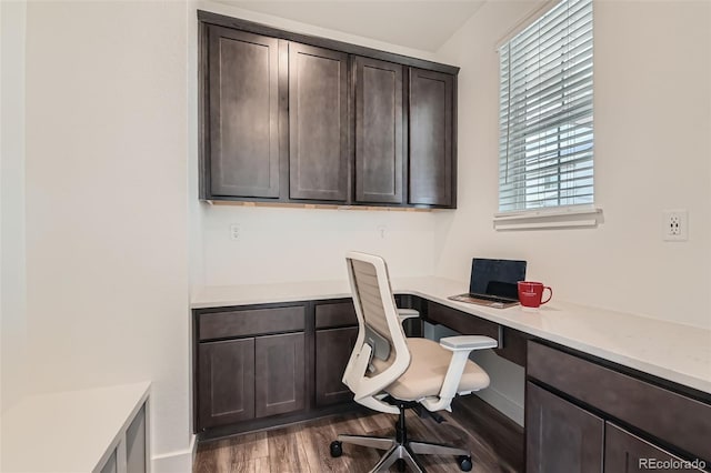 14551 Hudson St, Thornton, CO 80602 - office area featuring built in study area and dark wood-style floors
