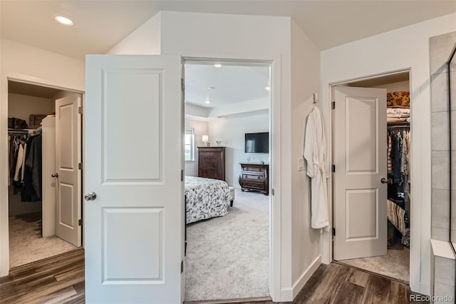 14551 Hudson St, Thornton, CO 80602 - hallway with dark wood-style flooring and recessed lighting