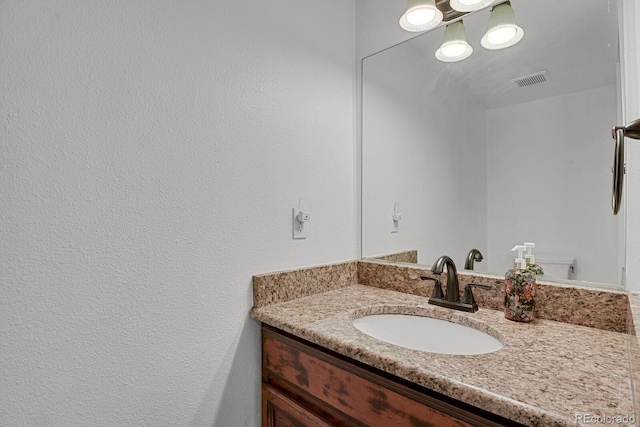 14396 E Temple Pl Unit D, Aurora, CO 80015 - bathroom featuring vanity and toilet