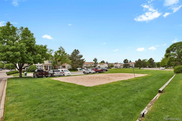14396 E Temple Pl Unit D, Aurora, CO 80015 - view of community featuring a yard, a residential view, and volleyball court