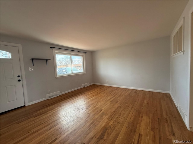 4670 Independence St, Wheat Ridge, CO 80033 - entrance foyer featuring wood finished floors and baseboards