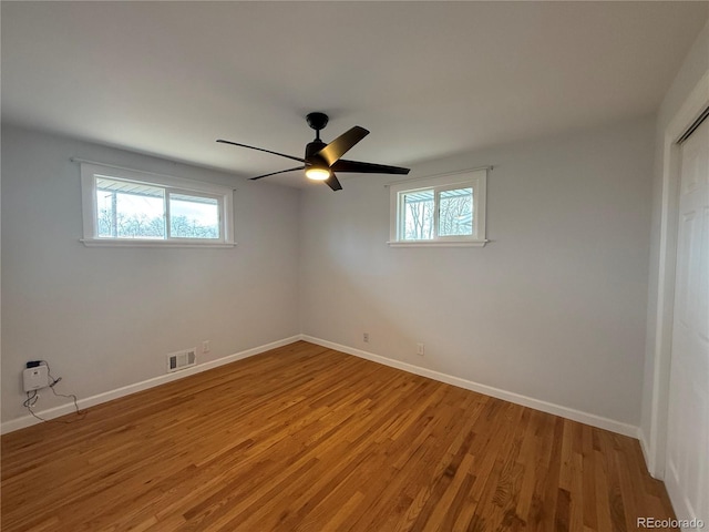 4670 Independence St, Wheat Ridge, CO 80033 - unfurnished bedroom featuring light wood-style flooring, baseboards, and a ceiling fan
