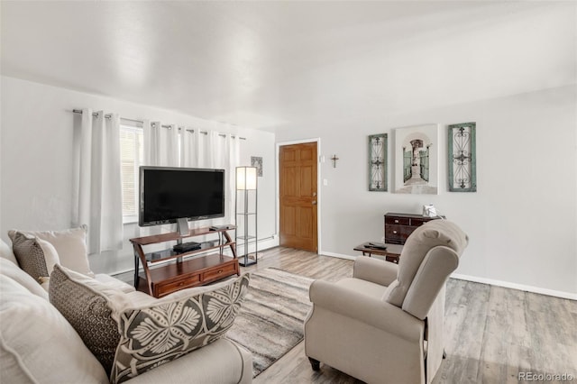 living room with light hardwood / wood-style floors