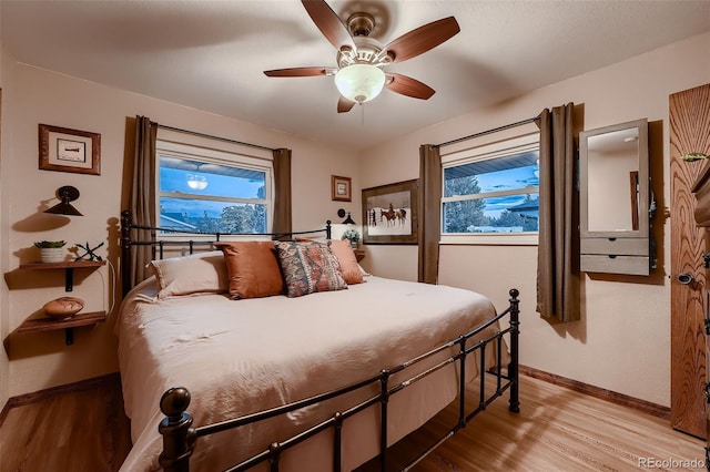 5900 W 62nd Ave, Arvada, CO 80003 - bedroom featuring wood finished floors and a ceiling fan