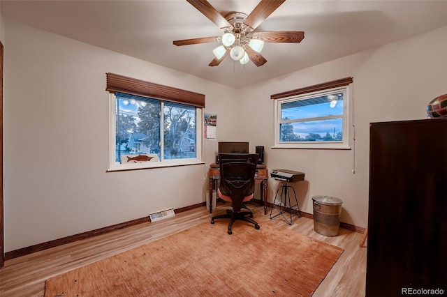 5900 W 62nd Ave, Arvada, CO 80003 - office area featuring light wood finished floors and ceiling fan