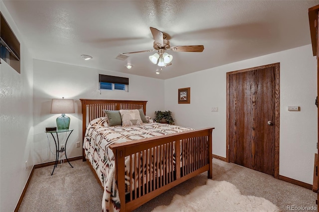5900 W 62nd Ave, Arvada, CO 80003 - carpeted bedroom featuring baseboards and a ceiling fan