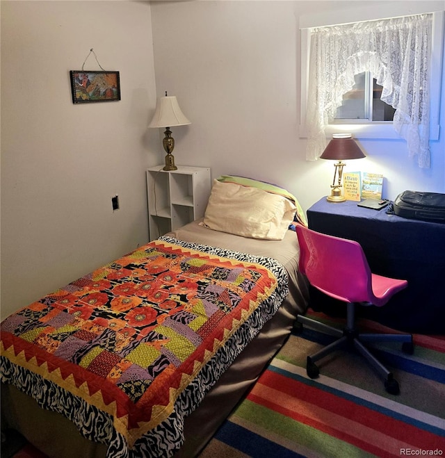 bedroom featuring carpet flooring