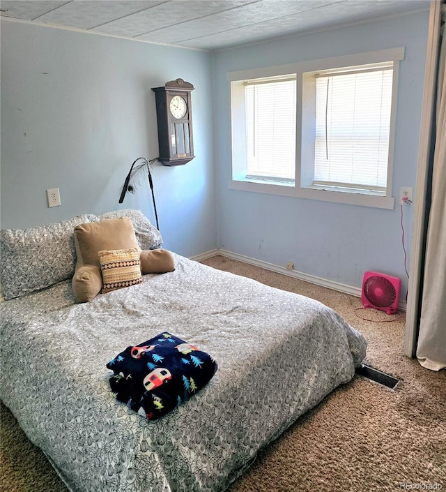 bedroom featuring carpet