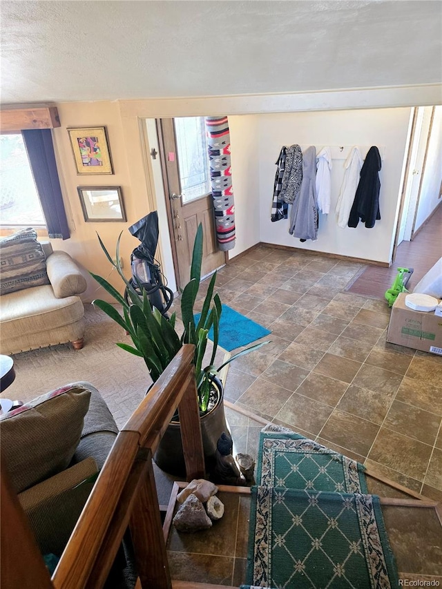 living room with a textured ceiling