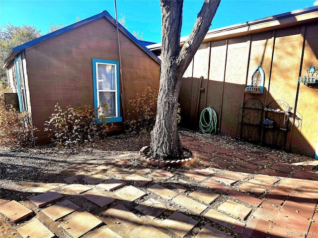 view of home's exterior featuring a patio