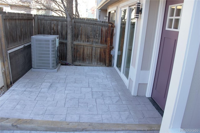 view of patio with central AC unit