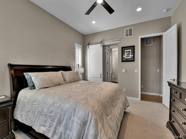 11464 Stonewash St, Littleton, CO 80125 - bedroom with a barn door, light carpet, baseboards, recessed lighting, and ceiling fan