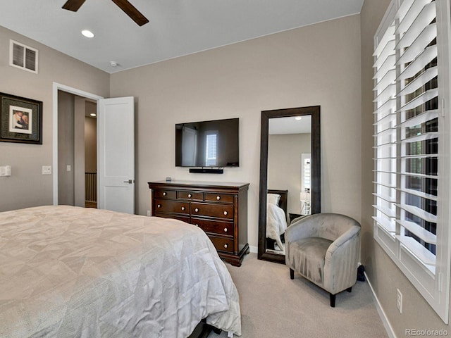 11464 Stonewash St, Littleton, CO 80125 - bedroom with light colored carpet, multiple windows, ceiling fan, baseboards, and recessed lighting