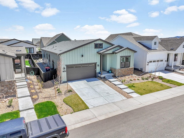 11464 Stonewash St, Littleton, CO 80125 - modern farmhouse featuring board and batten siding, driveway, a shingled roof, a residential view, and fence
