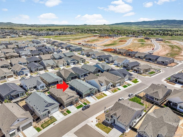 11464 Stonewash St, Littleton, CO 80125 - aerial perspective of suburban area featuring a mountain backdrop