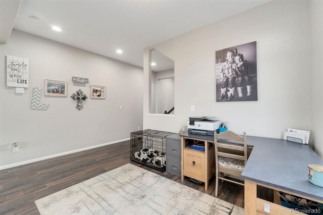 office space featuring dark hardwood / wood-style flooring