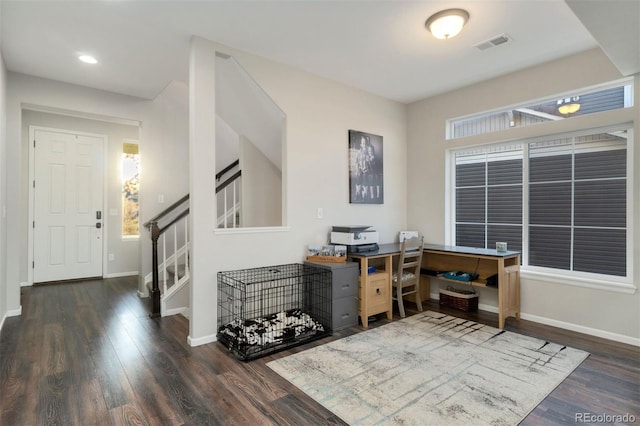 office area with dark hardwood / wood-style flooring