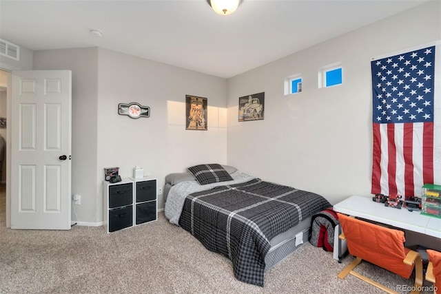 bedroom featuring carpet