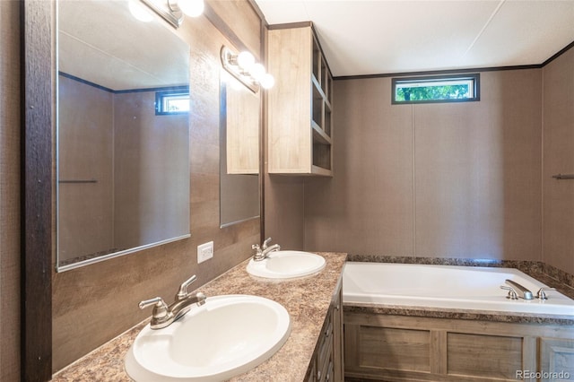 916 Glen Heather Ct, Dacono, CO 80514 - bathroom featuring a bath and double vanity