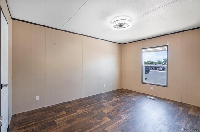916 Glen Heather Ct, Dacono, CO 80514 - empty room featuring wood finished floors