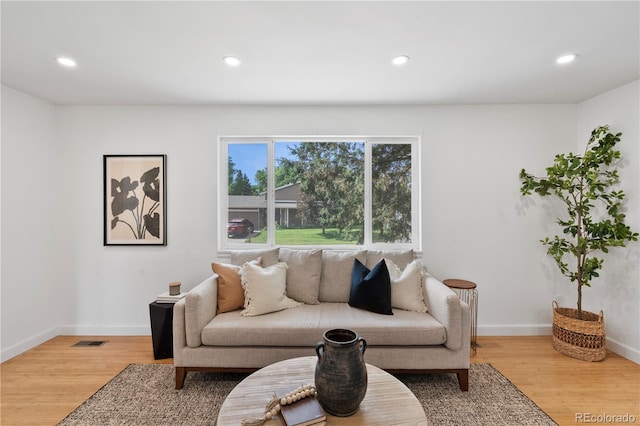 9123 W Arbor Ave, Littleton, CO 80123 - living room featuring light wood finished floors and recessed lighting