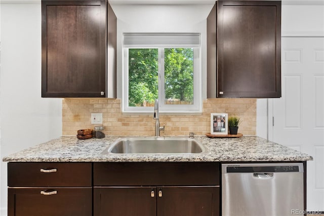 9123 W Arbor Ave, Littleton, CO 80123 - kitchen featuring stainless steel dishwasher, dark brown cabinets, decorative backsplash, and light stone countertops