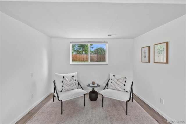 9123 W Arbor Ave, Littleton, CO 80123 - sitting room with wood finished floors