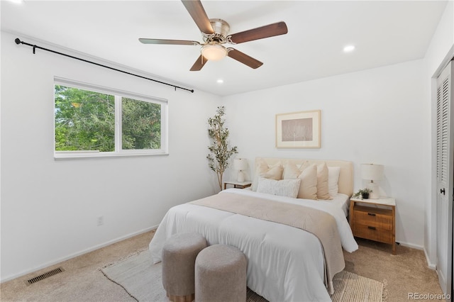 9123 W Arbor Ave, Littleton, CO 80123 - bedroom with light colored carpet, a closet, recessed lighting, and ceiling fan