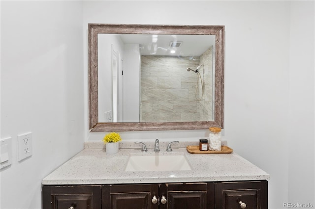 9123 W Arbor Ave, Littleton, CO 80123 - bathroom featuring vanity and a shower