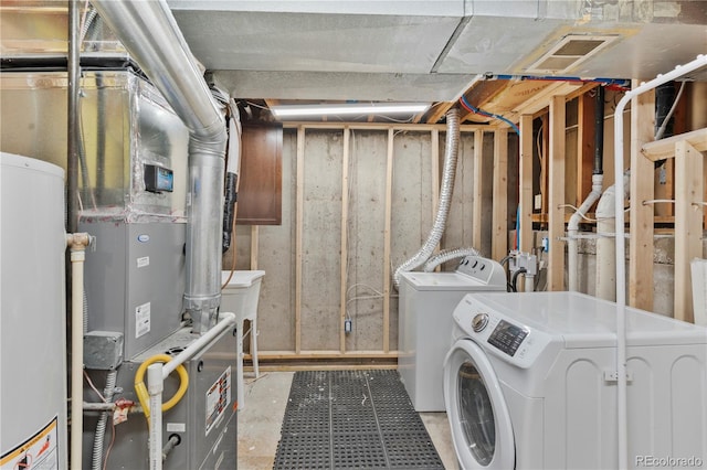 9123 W Arbor Ave, Littleton, CO 80123 - washroom with separate washer and dryer and water heater