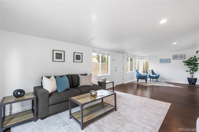 404 S Jasmine St, Denver, CO 80224 - living area featuring wood finished floors, baseboards, and recessed lighting