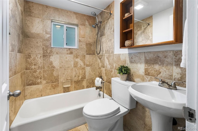 404 S Jasmine St, Denver, CO 80224 - full bathroom featuring shower / bathtub combination, toilet, and tile walls