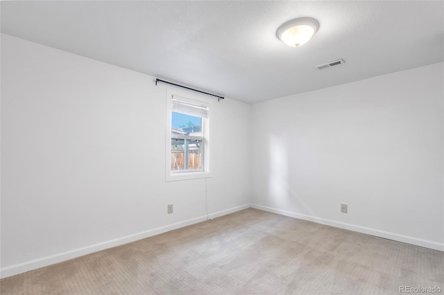 404 S Jasmine St, Denver, CO 80224 - unfurnished room with baseboards and light colored carpet