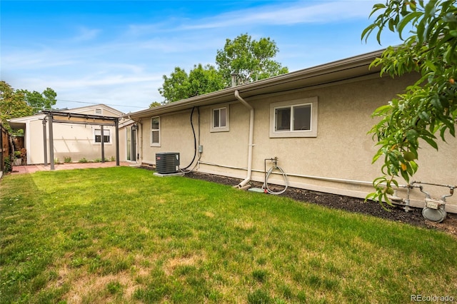 404 S Jasmine St, Denver, CO 80224 - back of house with stucco siding and central AC unit