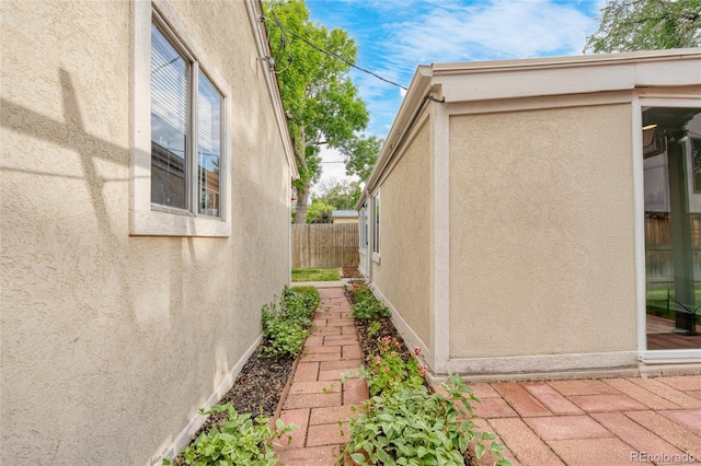 404 S Jasmine St, Denver, CO 80224 - view of side of home with stucco siding