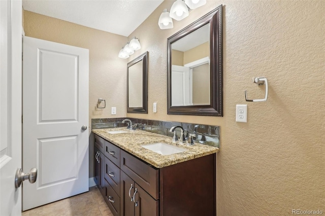 4293 Graham Ct, Boulder, CO 80305 - bathroom with double vanity and a textured wall