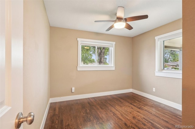 4293 Graham Ct, Boulder, CO 80305 - empty room with healthy amount of natural light, dark wood finished floors, baseboards, and ceiling fan