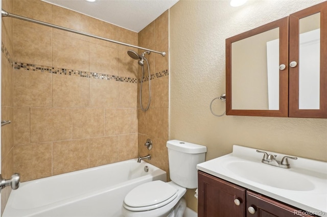 4293 Graham Ct, Boulder, CO 80305 - full bathroom featuring a textured wall, toilet, vanity, and tub / shower combination