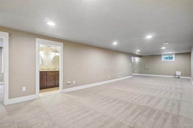 4293 Graham Ct, Boulder, CO 80305 - below grade area with recessed lighting, light colored carpet, and baseboards