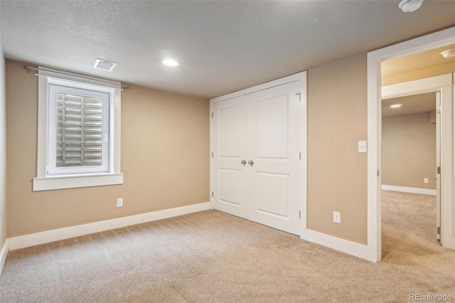 4293 Graham Ct, Boulder, CO 80305 - unfurnished bedroom with carpet, baseboards, a closet, and recessed lighting