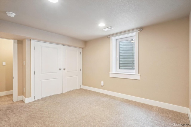4293 Graham Ct, Boulder, CO 80305 - unfurnished bedroom featuring light carpet, baseboards, and a closet
