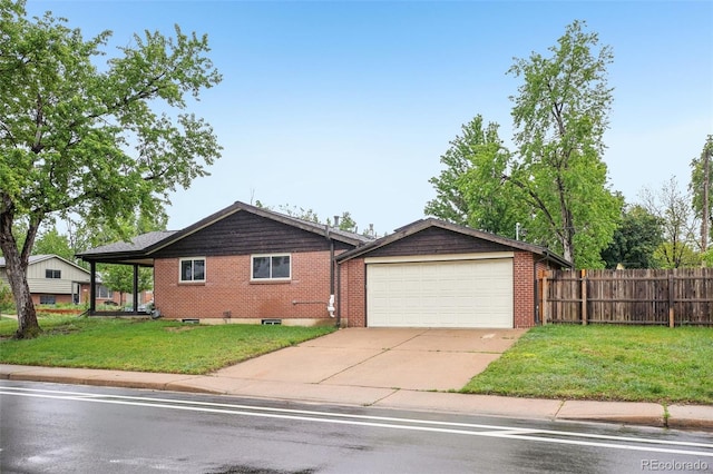 4293 Graham Ct, Boulder, CO 80305 - view of front of property featuring an attached garage, driveway, and brick siding