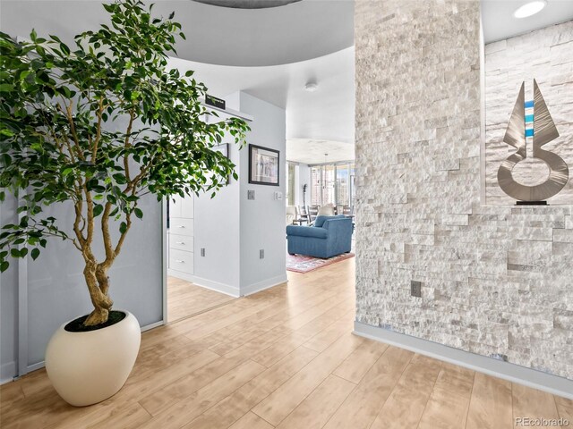 891 14th St Unit 1709, Denver, CO 80202 - hall featuring wood finished floors and baseboards