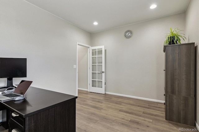 office with recessed lighting, baseboards, and wood finished floors