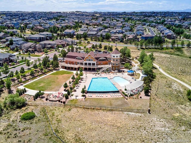 birds eye view of property with a residential view