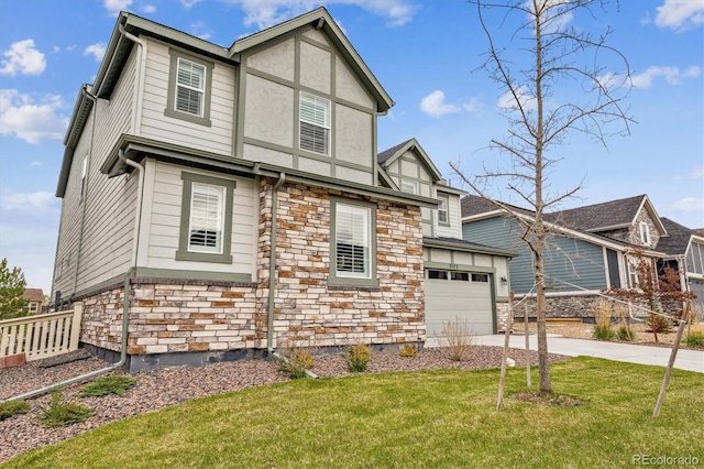 tudor house featuring stucco siding, a front lawn, stone siding, concrete driveway, and an attached garage