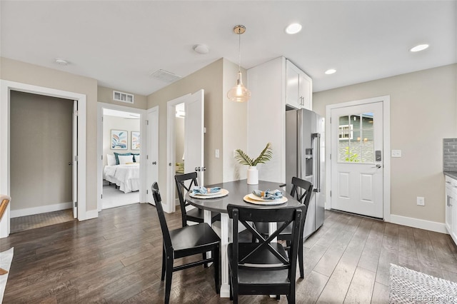 1655 N Yates St, Denver, CO 80204 - dining space with hardwood / wood-style flooring and recessed lighting